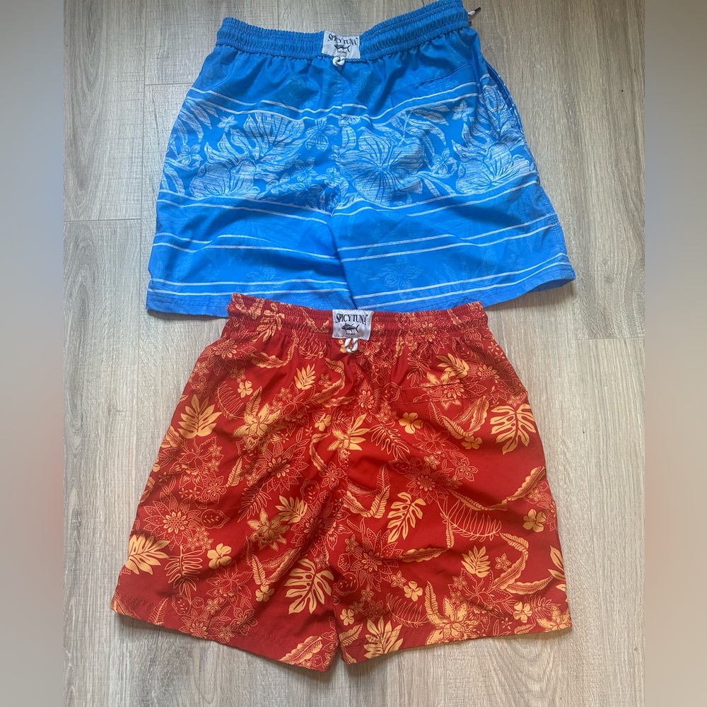 Men’s swim trunks, draw strings, mesh lining size Small. Spicy Tuna